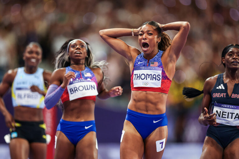 Olympic Women’s 200 — The Night Belonged To Thomas - Track & Field News