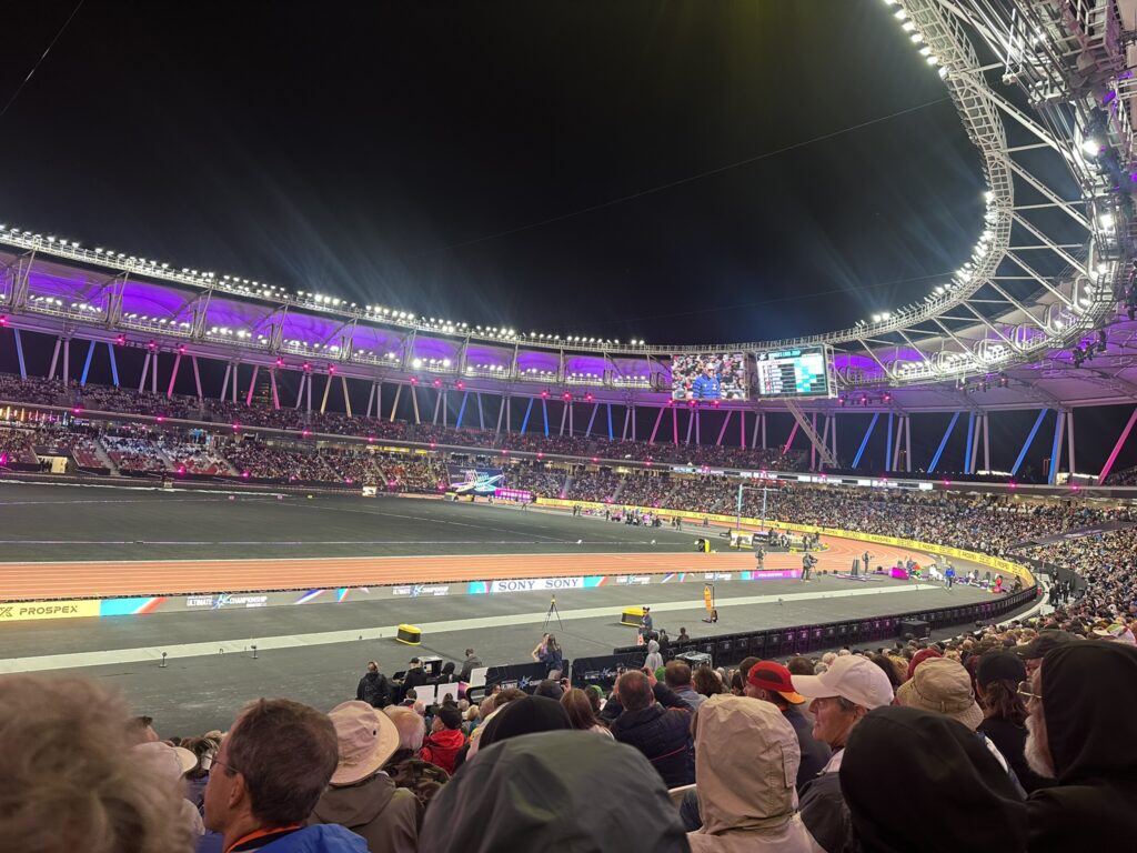 Dramatic Black Infield And Neon Colored Lights At The Budapest Stadium